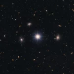 Image du télescope spatial James Webb montrant Earendel, le point lumineux le plus éloigné jamais observé, au cœur d’un amas de galaxies.