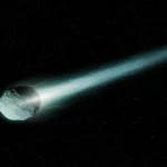 Illustration d’une comète traversant l’espace avec une longue traînée lumineuse.