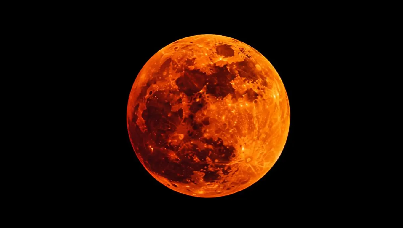 Image de la Lune teintée de rouge vif lors d’une éclipse totale, surnommée « Lune de sang ».