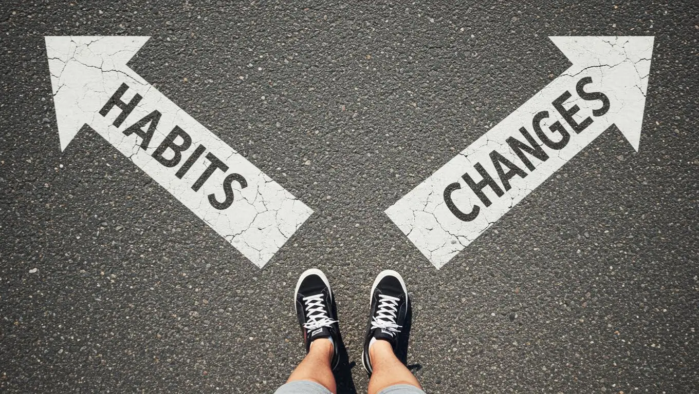 Pieds en face de deux flèches tracées au sol indiquant “Habits” et “Changes”, symbolisant le choix entre habitude et changement.