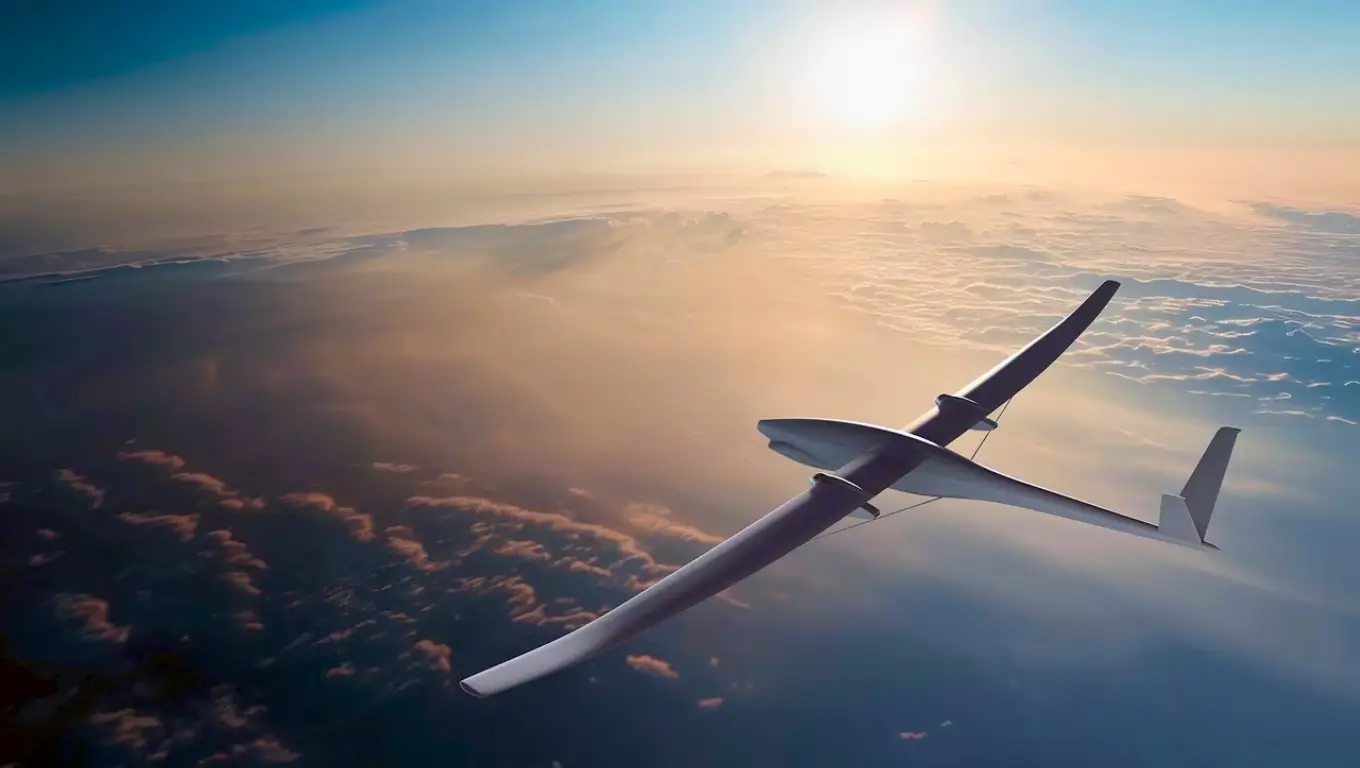 Avion futuriste volant au-dessus des nuages au lever du soleil, technologie aérienne innovante