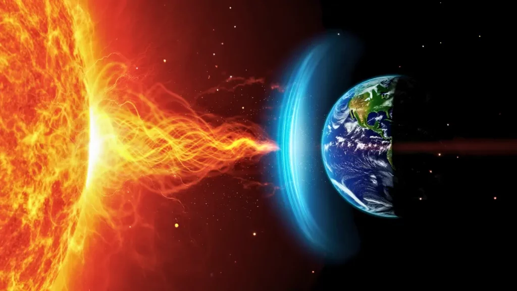 Illustration d’une éruption solaire projetant un flux de particules incandescentes vers la Terre protégée par son champ magnétique bleu.