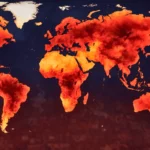 Carte mondiale montrant de vastes régions en rouge intense, illustrant l’augmentation des températures et l’ampleur du réchauffement climatique.