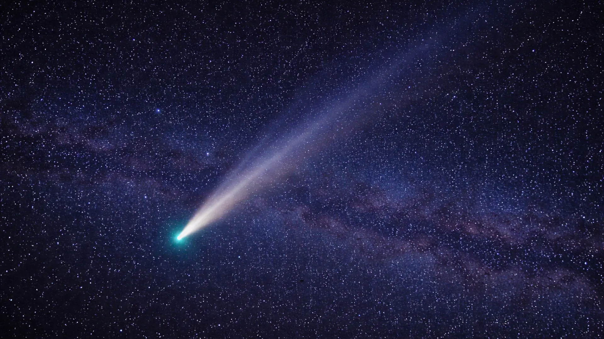 Comète brillante traversant un ciel étoilé, observée et découverte par des astronomes amateurs français en 2026